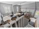 Spacious garage with room for boat and golf cart, featuring stairs leading to the garage at 172 Sam Solomon Rd, Locust Grove, GA 30248
