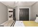 Bedroom features carpet floors and ample closet space for organized storage at 307 Bellingrath Ct, Peachtree City, GA 30269