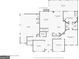 First floor plan featuring a spacious layout with a living room, kitchen, primary bedroom, and attached garage at 307 Bellingrath Ct, Peachtree City, GA 30269