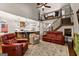 Open-concept living room boasts hardwood floors, a vaulted ceiling, and seamless flow to the kitchen at 307 Bellingrath Ct, Peachtree City, GA 30269