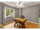 This office has hardwood floors and a window that allows for natural light at 307 Bellingrath Ct, Peachtree City, GA 30269