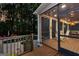 Peaceful screened porch with views of the swimming pool and landscaping, perfect for relaxing outdoors at 307 Bellingrath Ct, Peachtree City, GA 30269