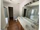Bathroom featuring double sinks, tile flooring and a separate tub and shower, a relaxing retreat for homeowners at 2355 Burdett Ridge Dr, South Fulton, GA 30349