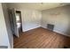 Bedroom with hardwood flooring and blank walls. A room ready for your design at 2355 Burdett Ridge Dr, South Fulton, GA 30349