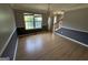 Inviting dining room featuring wood floors and a classic chandelier, great for Gathering meals and entertaining at 2355 Burdett Ridge Dr, South Fulton, GA 30349