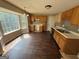 Spacious kitchen awaiting renovation with large windows and ample cabinet space, ready for a modern upgrade at 2355 Burdett Ridge Dr, South Fulton, GA 30349