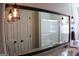 Bathroom features a granite countertop, a shower, a toilet, and matching hardware at 1310 Larkview Sw Dr, Lilburn, GA 30047