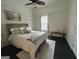 Cozy bedroom showcasing a ceiling fan and inviting decor at 1012 Institute Nw St, Conyers, GA 30012