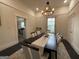 Stylish dining room showcasing an elegant light fixture at 1012 Institute Nw St, Conyers, GA 30012