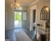 Inviting entryway with dark wood floors, chandelier, and stylish decor at 1012 Institute Nw St, Conyers, GA 30012