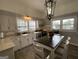 Cozy kitchen featuring white cabinets, modern appliances, and a kitchen island at 1012 Institute Nw St, Conyers, GA 30012