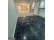 View of the basement featuring tiled and carpeted flooring at 2532 N Carroll Ct, Villa Rica, GA 30180