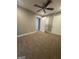 Comfortable bedroom featuring neutral walls, plush carpet, and ample closet space at 2532 N Carroll Ct, Villa Rica, GA 30180