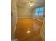 Bedroom featuring wood floor, ceiling fan and window at 2532 N Carroll Ct, Villa Rica, GA 30180