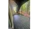 Outdoor deck and staircase, perfect for relaxing and enjoying the surrounding nature at 2532 N Carroll Ct, Villa Rica, GA 30180