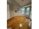 Sunlit dining area with hardwood floors and neutral wall color at 2532 N Carroll Ct, Villa Rica, GA 30180