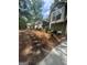 Exterior showcasing driveway, landscaping, and architectural details of the home at 2532 N Carroll Ct, Villa Rica, GA 30180