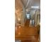 Foyer with hardwood floors, staircase, skylight, and access to multiple rooms at 2532 N Carroll Ct, Villa Rica, GA 30180