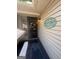Charming front porch featuring a stylish door, light fixture, and decor at 2532 N Carroll Ct, Villa Rica, GA 30180