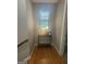Hallway nook with window seat and console table at 2532 N Carroll Ct, Villa Rica, GA 30180