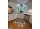 A well-lit kitchen with stainless steel appliances and granite countertops at 2532 N Carroll Ct, Villa Rica, GA 30180