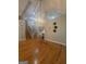 Open-concept living area with vaulted ceilings, hardwood floors, and modern lighting at 2532 N Carroll Ct, Villa Rica, GA 30180