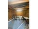 Spacious shed interior with ample storage options; featuring a high ceiling and organized layout at 2532 N Carroll Ct, Villa Rica, GA 30180