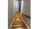 Hallway staircase features wood steps and wood handrail at 2532 N Carroll Ct, Villa Rica, GA 30180