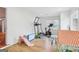 Bright gym featuring exercise equipment and toys atop light wood-look flooring, perfect for Gathering fitness at 456 Pretty View Se Ln, Smyrna, GA 30082