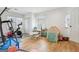 Bright playroom with hardwood floors, multiple windows, and fun furniture, perfect for play and activities at 456 Pretty View Se Ln, Smyrna, GA 30082