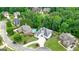Sprawling home nestled within a lush, wooded community, features a sparkling swimming pool at 6017 Chestatee Creek Nw Ct, Acworth, GA 30101
