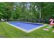 Backyard pool with fence and manicured lawn, perfect for relaxation and outdoor enjoyment at 6017 Chestatee Creek Nw Ct, Acworth, GA 30101
