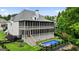 Stunning home with an outdoor pool and screened in back porch with a well maintained lawn and privacy at 6017 Chestatee Creek Nw Ct, Acworth, GA 30101