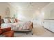 Spacious bedroom featuring neutral colors, carpet, a queen-sized bed and a large window at 6017 Chestatee Creek Nw Ct, Acworth, GA 30101