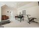 Large room with carpet, ceiling fan, and workout equipment at 6017 Chestatee Creek Nw Ct, Acworth, GA 30101