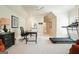 Spacious home office featuring a neutral color palette and ample workspace, perfect for productivity at 6017 Chestatee Creek Nw Ct, Acworth, GA 30101