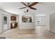 Inviting open living room space with hardwood floors and modern ceiling fan at 2714 Haynescrest Dr, Grayson, GA 30017