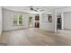 Open-concept living area with wood floors and lots of natural light at 2714 Haynescrest Dr, Grayson, GA 30017