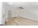 Bright living room with light wood floors, ceiling fan, and plenty of natural light at 2714 Haynescrest Dr, Grayson, GA 30017