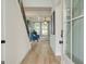 Inviting entryway with hardwood floors leads to a comfortable living space at 4484 Eastbrook Pl # 54B, Snellville, GA 30039