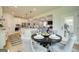 Bright eat-in kitchen with modern appliances, island with quartz countertops, and open to the living room at 4484 Eastbrook Pl # 54B, Snellville, GA 30039