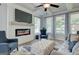 Cozy living room with fireplace, large windows, and coffered ceiling at 4484 Eastbrook Pl # 54B, Snellville, GA 30039