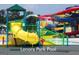 Wide view of an inviting community waterpark with slides and play structures at 4484 Eastbrook Pl # 54B, Snellville, GA 30039