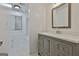 Bathroom with a single sink vanity, updated faucet, and a shower and tub combo at 205 Shadowood Ln, Peachtree City, GA 30269