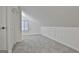 Bonus room featuring wall-to-wall carpet, light paint and natural light at 205 Shadowood Ln, Peachtree City, GA 30269