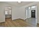 Bright entryway with white walls and light-colored wood flooring at 205 Shadowood Ln, Peachtree City, GA 30269