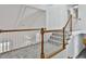 Second floor hallway with modern railing provides access to the stairs and other rooms at 205 Shadowood Ln, Peachtree City, GA 30269