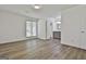 Spacious main bedroom with wood floors leads to the ensuite bathroom at 205 Shadowood Ln, Peachtree City, GA 30269