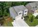 Aerial view of the brick home and driveway at 302 Aspen Valley Ln, Dallas, GA 30157