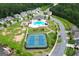Community amenities featuring pool, tennis courts, playground, clubhouse, and manicured landscaping at 302 Aspen Valley Ln, Dallas, GA 30157